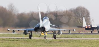 LEEUWARDEN, NETHERLANDS - APRIL 11, 2016: German Air Force Eurofighter landing during the exercise Frisian Flag. The exercise is considered one of the most important NATO training events this year.