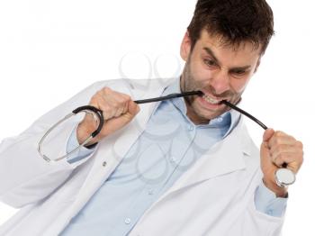 Humorous portrait of a young depressed surgeon with a stethoscope, isolated on white