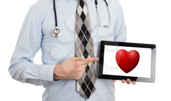 Doctor holding tablet, isolated on white - Red heart