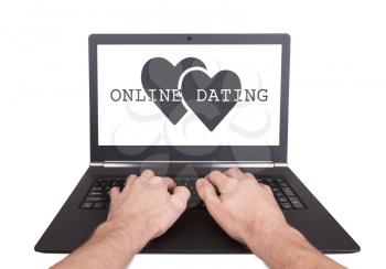 Man working on laptop, online dating, isolated