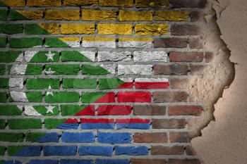 Dark brick wall texture with plaster - flag painted on wall - Comoros