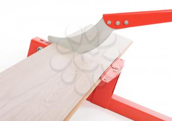 Red tool for cutting laminate, isolated on white