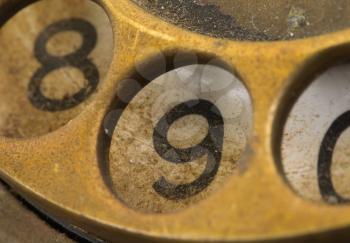 Close up of Vintage phone dial, dirty and scratched - 9, perspective