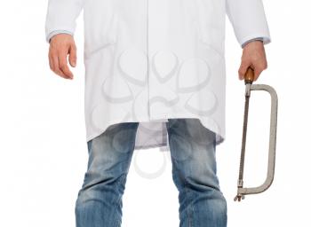 Crazy doctor is holding a big saw in his hands, isolated on white