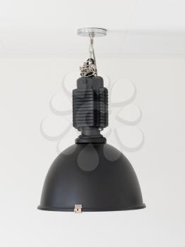 Black vintage lamp hanging on the ceiling