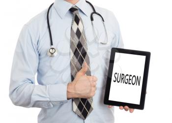 Doctor, isolated on white backgroun,  holding digital tablet - Surgeon