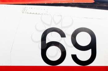 Painted number on an old war plane, isolated
