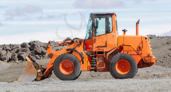 Large orange bulldozer on a building site