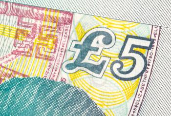 Pound currency background, close-up - 5 Pounds