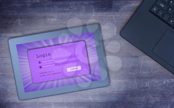 Login interface on tablet - username and password, purple, cold blue filter