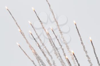 Flares with a trial of smoke, fired from a military jet
