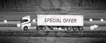White trruck driving through a rural area - Special offer
