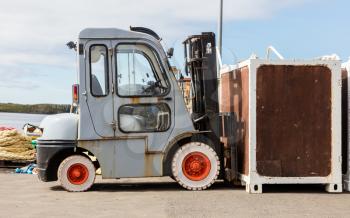 Old counterbalance forklift, small harbour in Iceland