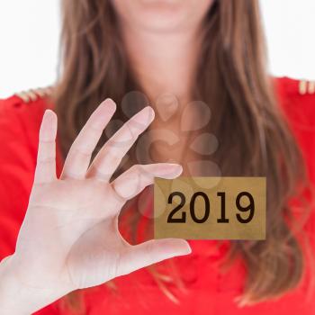 Woman showing a business card - New year - 2019