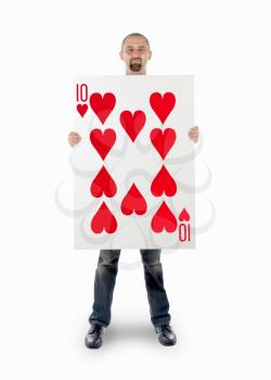 Businessman with large playing card - Ten of hearts