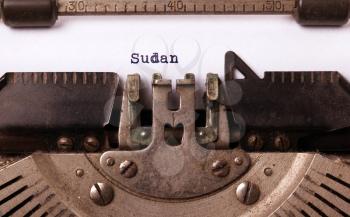 Inscription made by vintage typewriter, country, Sudan