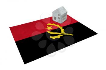 Small house on a flag - Living or migrating to Angola