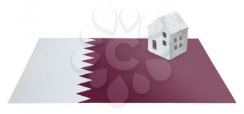 Small house on a flag - Living or migrating to Qatar