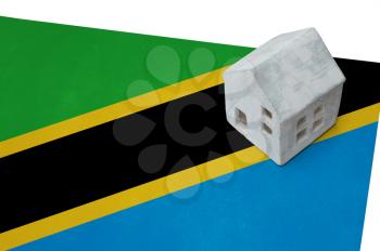 Small house on a flag - Living or migrating to Tanzania
