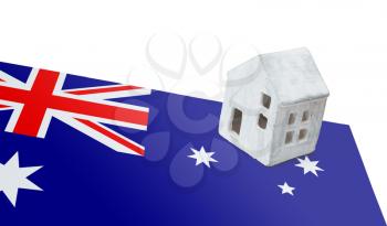 Small house on a flag - Living or migrating to Australia