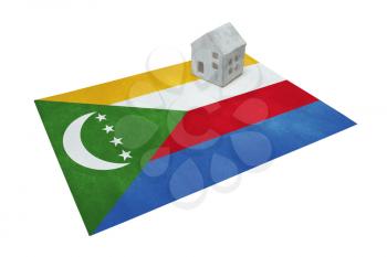 Small house on a flag - Living or migrating to Comoros