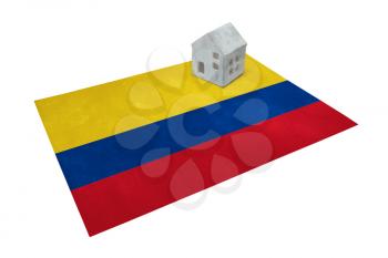 Small house on a flag - Living or migrating to Colombia
