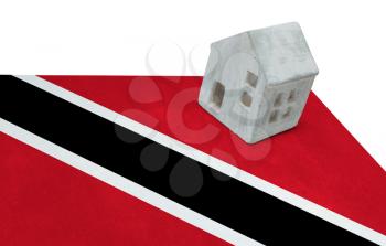 Small house on a flag - Living or migrating to Trinidad and Tobago
