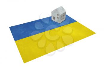 Small house on a flag - Living or migrating to Ukraine