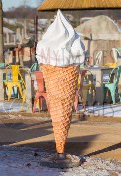 Ice cream cone in front of an ice cream bar