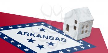 Small house on a flag - Living or migrating to Arkansas