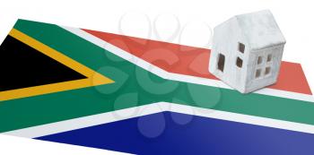 Small house on a flag - Living or migrating to South Africa
