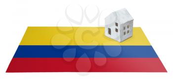 Small house on a flag - Living or migrating to Colombia