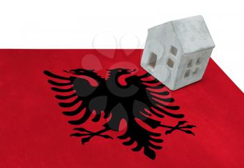 Small house on a flag - Living or migrating to Albania