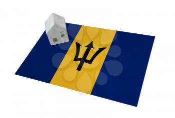 Small house on a flag - Living or migrating to Barbados