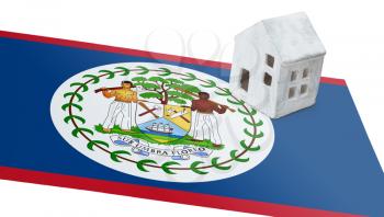 Small house on a flag - Living or migrating to Belize