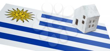 Small house on a flag - Living or migrating to Uruguay