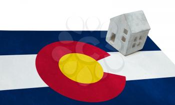 Small house on a flag - Living or migrating to Colorado