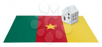 Small house on a flag - Living or migrating to Cameroon