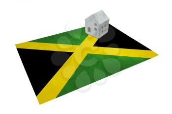 Small house on a flag - Living or migrating to Jamaica