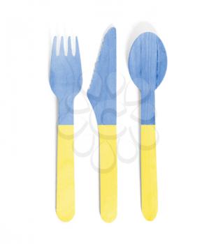 Eco friendly wooden cutlery - Plastic free concept - Isolated - Flag of Ukraine