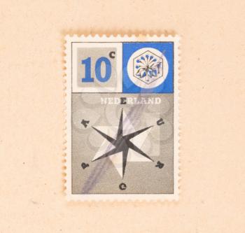 THE NETHERLANDS 1960: A stamp printed in the Netherlands shows a compass, circa 1960