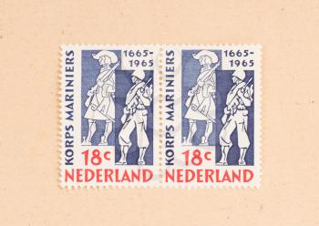 THE NETHERLANDS 1960: A stamp printed in the Netherlands shows the dutch royal marines, circa 1960