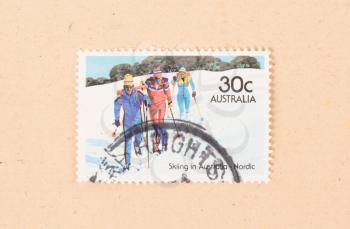 AUSTRALIA - CIRCA 1980: A stamp printed in Australia shows three men skiing in Australia Nordic, circa 1980
