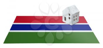 Small house on a flag - Living or migrating to Gambia