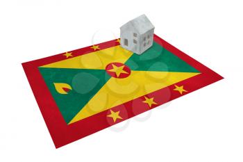Small house on a flag - Living or migrating to Grenada