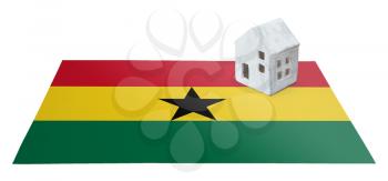 Small house on a flag - Living or migrating to Ghana