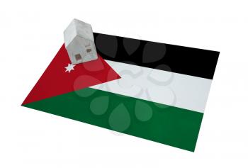 Small house on a flag - Living or migrating to Jordan