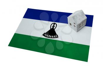 Small house on a flag - Living or migrating to Lesotho