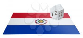Small house on a flag - Living or migrating to Paraguay