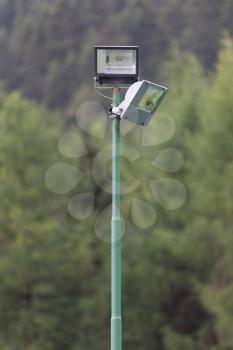Security light in a forest in Austria